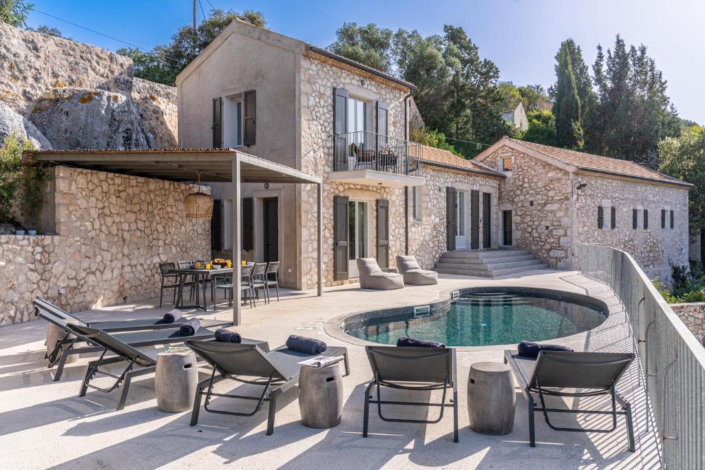 Reconstruction Of A Pre-Earthquake Building, Addition-Expansion & Construction Of Swimming Pool